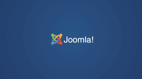 The Joomla multi-color chain link logo on a field of blue.
